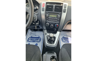 Hyundai Tucson 2, 0i  g-pl - автомобили, коли, обяви за нови и употребявани 12