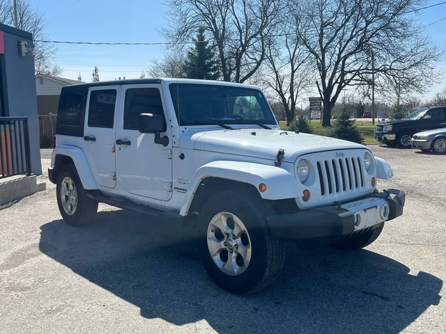 Jeep Wrangler Unlimited Sahara 4WD - автомобили, коли, обяви за нови и употребявани 0