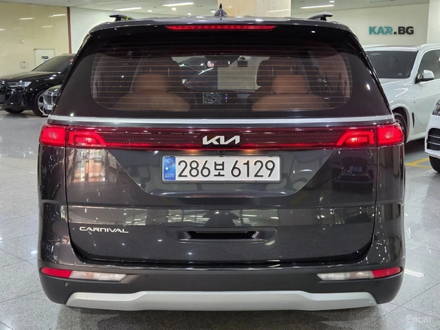 Kia Carnival PRESTIGE* 9МЕСТЕН* КОЖА* ОБДУХВ* ПОДГРЕВ* КАМЕРА - автомобили, коли, обяви за нови и употребявани 3
