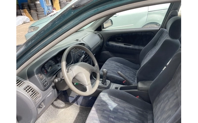 Mitsubishi Lancer 1.3 GLXi - автомобили, коли, обяви за нови и употребявани 6