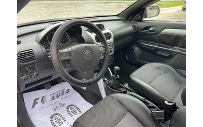 Opel Tigra 1.3CDTI-70-ITALIA - автомобили, коли, обяви за нови и употребявани 9