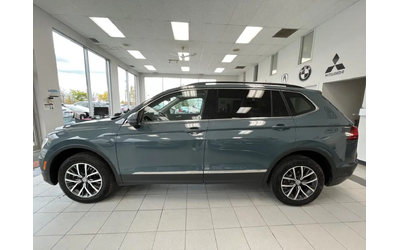 vw-tiguan-comfortline-awd-toit-gps-camera-cuir - 1