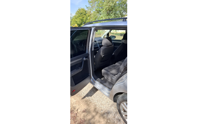 VW Touran 1.9 TDI 105 - автомобили, коли, обяви за нови и употребявани 13